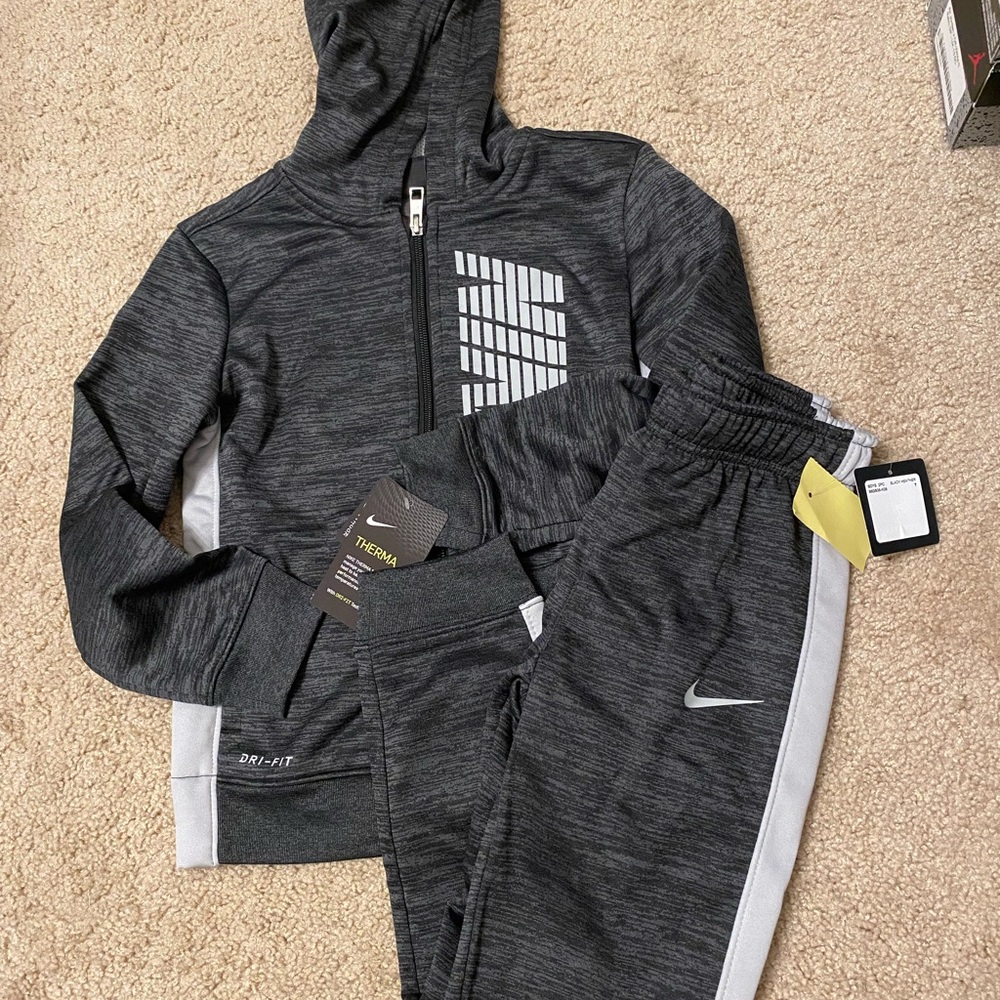 Nike tracksuit NWT Sz 7
